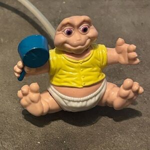 2/$25 Baby Sinclair Dinosaur Figurine with Yellow Vest and Blue Bowl